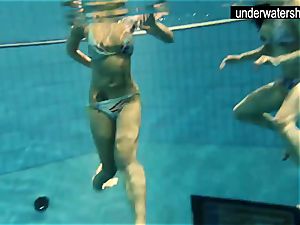2 beautiful amateurs demonstrating their bods off under water
